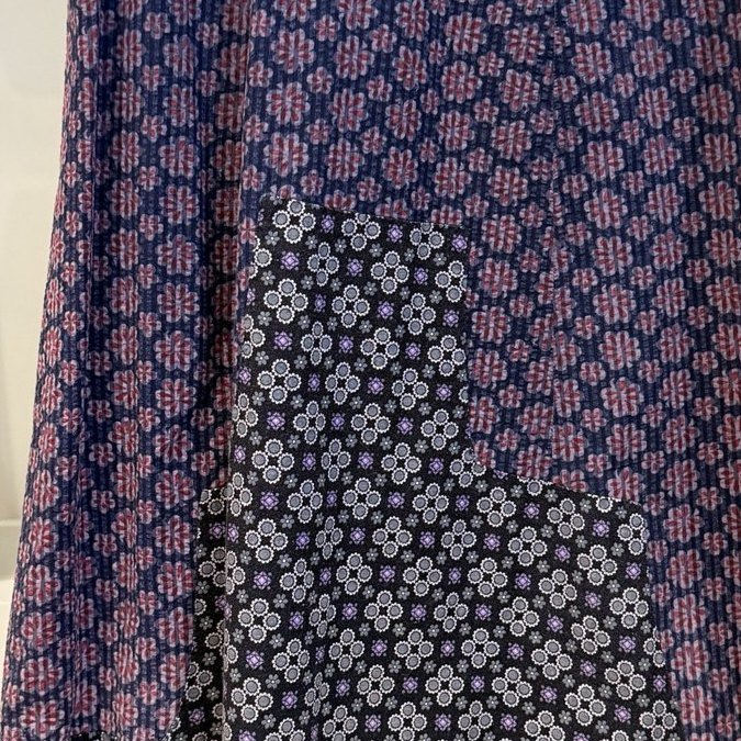 Two small-scale prints pieced together